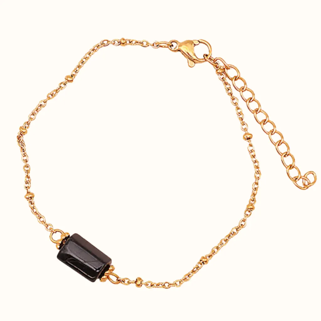 bougie-bijou-souffle-protecteur-bracelet-pierre-toumaline-lumen-temporis1.webp