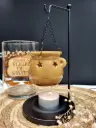 Bruleur à fondant parfumé - chaudron étoilé suspendu ocre